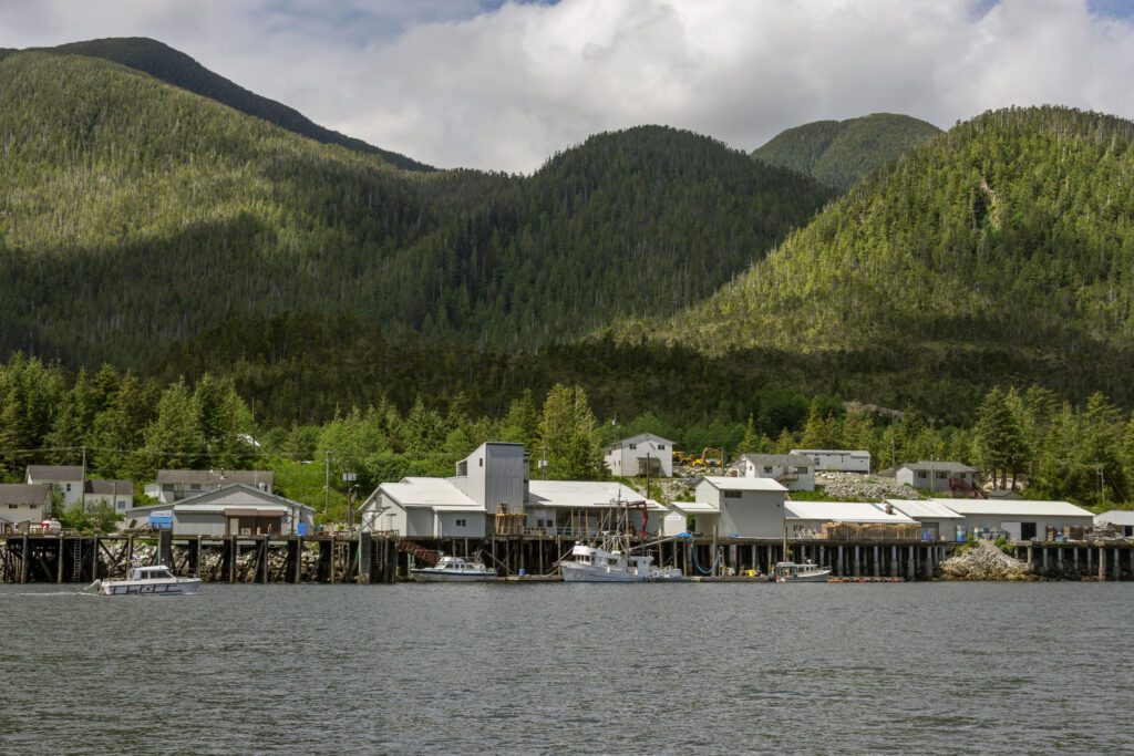Klemtu village and wharf seen from the ocean, Swindle Island, British Columbia