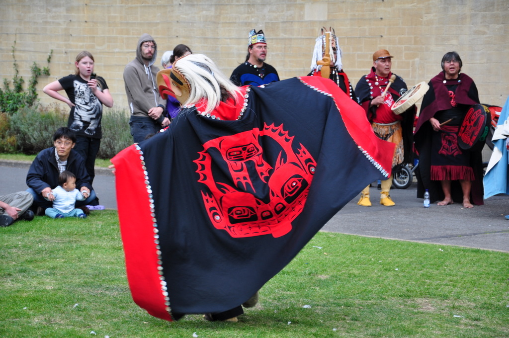 An indigenous person dancing