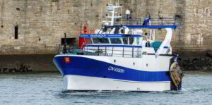 Telemaque scallop fisher and trawler France blue and white fishing vessel