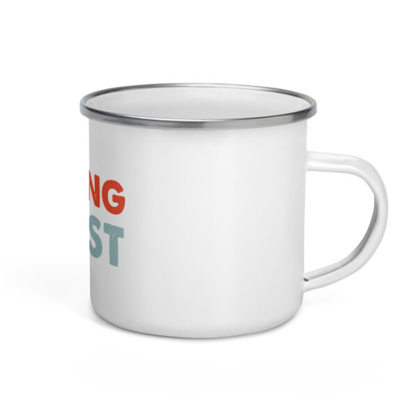 An enamel white mug with the Strong Coast logo on it.